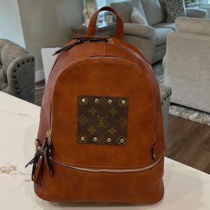 Lisa Robertson Tobacco touch of couture inspired backpack - used a few times.